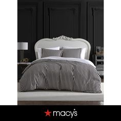 black and white striped bedding in a bedroom