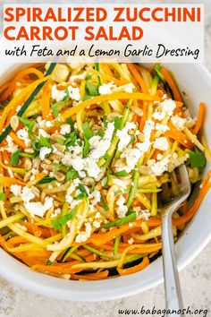 a white bowl filled with carrot salad and feta cheese