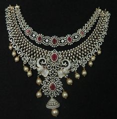 Magnificent 18K Gold Diamond Necklace with Red Color Stones & Pearls - 1-BG-DN-SET04457 - in 128.870 Grams for USD $21417.23. 
Made in India by Totaram Jewelers Online this product is in Gold - 18 Karat Gold  & is an excellent gift for Adult - Women. Ships fully insured with secured guaranteed delivery for free with your order over $250 from New Jersey USA & comes with 30 days exchange policy. Formal Red Diamond Necklace With 17 Jewels, Luxury Red Jewelry For Festive Occasion, Luxury Red Festive Jewelry, Luxury Red Bridal Necklace For Celebration, Luxury Red Jewelry With Intricate Design, Red Pendant Necklace With Intricate Design, Exquisite Red Pendant Necklace, Red Intricate Pendant Necklace, Formal Red Bridal Necklace With Intricate Design