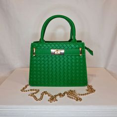 Womens green faux leather woven textured top handle evening clutch bag with gold embellishment, double internal compartments and zip closing top Can be used with or without long shoulder chain (included) size approx- H 14cm x W 20cm Free Royal Mail delivery is an estimated 3-5 days but this can occasionally be slightly longer which solely on the Royal Mail side. We do offer guaranteed next day delivery but please contact us prior to ordering as this would incur a small upgraded shipping charge. We also offer WORLDWIDE shipping - please contact us for more info 💕🌍 Office Crossbody Bag With Braided Handles, Party Crossbody Satchel With Zipper Closure, Formal Satchel Bag With Braided Handles, Evening Satchel With Braided Handles Crossbody, Elegant Office Satchel With Braided Handles, Evening Bag With Zipper Closure And Top Handle, Luxury Green Clutch For Daily Use, Gold Shoulder Bag With Braided Handles For Formal Occasions, Formal Gold Shoulder Bag With Braided Handles