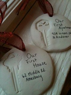 two white rocks with writing on them that say, make a safe dough imprint of the keys to your first apartment and first house to save as an awesome keepsake