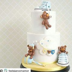 a baby shower cake with teddy bears on top