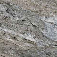 a close up view of the surface of a marbled countertop with grey and white colors