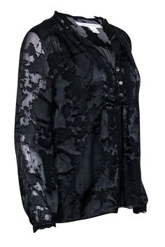 The appeal of this delicate, black silk blouse by beloved label Diane von Furstenberg is truly in the details. Textured silk features a sheer "burnout" design with lining and iridescent buttons at the chest. A loose fit and button detail make it the perfect companion for a midi skirt and suede pumps for the work day. Switch into dark denim and knee-high boots for dinner with friends. Size 8 Shell 63% Rayon, 37% Silk Lining 100% Polyester Loose fit Open neckline Iridescent button closure Textured detail Elastic sleeve cuff Semi-sheer Bust 40" Waist 42" Shoulder to hem 25" Sleeve length 23" Black Silk Blouse With Sheer Sleeves, Sheer Black Silk Blouse, Black Sheer Silk Blouse, Black Silk Blouse, Dinner With Friends, Sleeve Cuff, Suede Pumps, First Lady, Dark Denim