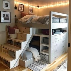 a loft bed with stairs leading up to it