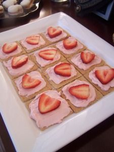 strawberries are arranged in squares on a plate