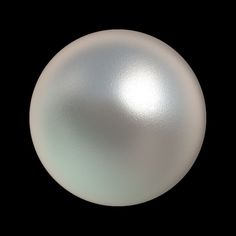 a shiny white ball on a black background