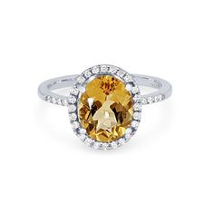 Sport a beautiful shade of orange with this ring, featuring an oval cut citrine weighing 2.50 carats surrounded by a halo of round brilliant cut diamonds totaling 0.21 carats. Shade Of Orange, Oval Halo Ring, Diamonds Direct, Shades Of Orange, Halo Ring, Halo Rings, Oval Diamond, Round Brilliant Cut Diamond, Oval Cut