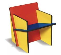 a colorful chair sitting on top of a white floor next to a red, yellow and blue table