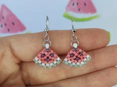 These beautiful beaded Watermelon earrings are small and simple, which makes them perfect for everyday wear, but also suitable for special occasions.  ✤ SIZE (Approx.): ▸ Lenght: 2,5 cm (0.98 inches). ✤ MATERIAL: ▸ Pastel red, pastel green, pearl white and dark silver beads (size 11/0). ▸ Strong and durable beading thread. ▸ High quality stainless steel ear wire. Please note that colors may appear slightly different due to variations in monitors and browsers. ✤ SHIPPING: ▸ I will ship as soon as Hypoallergenic Beaded Earrings With Round Beads For Summer, Summer Hypoallergenic Earrings With Round Beads, Summer Teardrop Earrings With Tiny Beads, Teardrop Earrings With Tiny Beads For Summer, Summer Hypoallergenic Beaded Dangle Earrings, Beaded Watermelon, Watermelon Jewelry, Beaded Fruit, Earrings Handmade Beaded