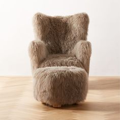 a chair made out of furry material on a white background