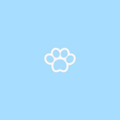 a white paw print on a blue background