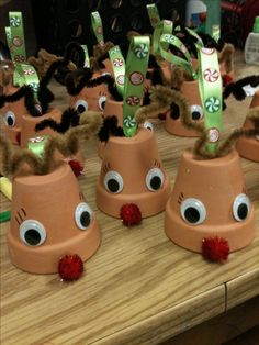 some very cute little hats with googly eyes on it's heads and ears