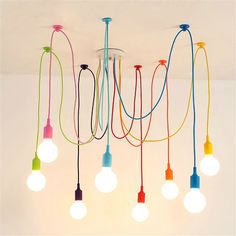 multicolored light bulbs hanging from the ceiling