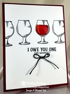 a card with three glasses of wine and the words i love you one on it