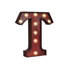 the letter t is lit up with lights