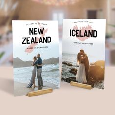 two new zealand book covers are shown on a table with the ocean in the background