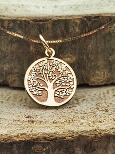 14k Solid Gold Tree of Life Necklace, Personalized Tree of Life Pendant, Gold Tree of Life Necklace, Gift for Her, Gold Tree of Life Pendant, Solid Disc Pendant - Material: 14K solid gold (not plated and not gold filled) - Pendant Thickness: 0.5mm=0.019inch - Jump ring diameter: 4mm = 0.15 inch - Punch: 585 = 14kt     A hallmark 585 (stamp) of the material of your pendant will be included on the back for certification. DIMENSIONS -0.50inches / 12.7mm ( small pendant ideal for bracelets ) -0.55 i Tree Of Life Necklace Gold, Adjustable Round Pendant With Tree Of Life, Elegant Yellow Gold Tree Of Life Necklace, Yellow Gold Tree Of Life Pendant Jewelry, Silver Tree Of Life Pendant, Gold Tree, Tree Of Life Necklace, Disc Pendant, Tree Of Life Pendant