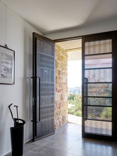 an open door leading to a patio area