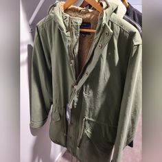 This Is A Brand New Coat,Never Been Worn. It Is A Longer Coat So Even Though It Says Small This Coat Will Go Below The Waist Green Fall Parka For Workwear, Casual Parka For Workwear In Fall, Casual Khaki Parka For Workwear, Everyday Green Utility Jacket For Winter, Long Coat, Mens Jackets, Jackets & Coats, Man Shop, Brand New