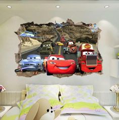 the cars are on the road through the hole in the wall sticker, and it's easy to put together