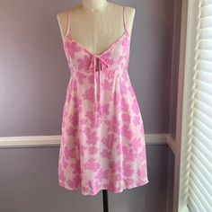 Pink Floral Lightweight Fit And Flare Mini Dress With Side Pockets And Adjustable Straps. 2 Front Slits At The Hem. Front Tie At The Bust. New To Poshmark? Use Code Robinrosen6 To Sign Up And Receive $10.00 Off From Poshmark On Your First Purchase Pink Summer Mini Dress For Loungewear, Fitted Pink Sundress For Daytime, Pink Floral Sundress For Daytime, Pink Cotton Sundress For Daytime, Waistline Dress, Fit And Flare Mini Dress, Coral Mini Dress, Satin Bodycon Dress, Knit Skater Dress