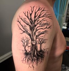 a man with a tree tattoo on his arm