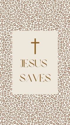 the words jesus saves in gold on a leopard - print background with a cross above it