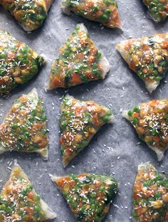 several pieces of food are arranged on a baking sheet