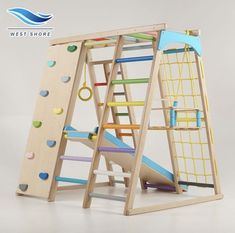 a child's wooden play set with climbing bars