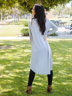 A fun twist on a classic cut. The button down detailing and the high low hem is so flattering & stylish. Details Small 0-4 Medium 6-8 Large 10-12 XL 12-14 Model is 5'5" wearing small Casual Spring Cardigan With Asymmetrical Hem, Casual Cardigan With Asymmetrical Hem For Fall, Casual Asymmetrical Hem Cardigan For Layering, Spring Cardigan With Asymmetrical Hem For Layering, Asymmetrical Hem Cardigan For Spring Layering, Maxi Skirt Dress, Graphic Apparel, Romper Pants, Knee Length Skirt