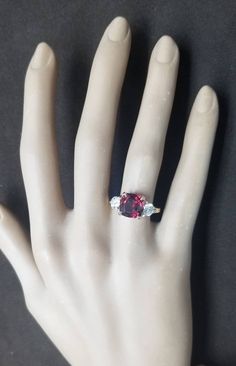 GORGEOUS 14K yellow gold engagement ring natural red garnet in cushion shape center natural garnet weight 3.52ct. size 9x9mm very nice rich red color nice luster, very lively ,nice cut.clean brilliant stone. side two round cut diamonds total weight 0.82ct. G-SI2 Size 4.8mm ring size 6 Resizable Appraisal available Retail value $8,500 net. Elegant Cushion Cut Ruby Ring, Elegant Cushion Cut Lab-created Ruby Jewelry, Cushion Cut Ruby Ring For Formal Occasions, Elegant Red Cushion Cut Ruby Ring, Formal Red Cushion Cut Ruby Ring, Emerald Ring Vintage, Yellow Gold Engagement Ring, Filigree Engagement Ring, Sparkling Rings