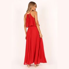 Wear this stunning red maxi dress to your next party! The maxi length and high neckline with front tie close feature ensures you'll look fabulous, while the pleated overlay design adds an extra touch of femininity. Party Maxi Dress With Pleated Back, Pleated Maxi Dress For Gala, Party Floor-length Maxi Dress With Pleated Bodice, Pleated Bodice Floor-length Maxi Dress For Party, Party Maxi Dress With Pleated Bodice And Floor-length, Floor-length Party Maxi Dress With Pleated Bodice, Floor-length Maxi Dress For Party With Pleated Bodice, Floor-length Maxi Dress With Pleated Back For Night Out, Pleated Floor-length Maxi Dress For Night Out