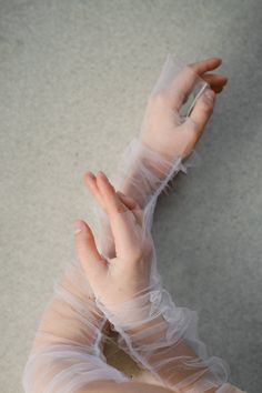 Tulle gloves are a beautiful, elegant, and sophisticated accessory, perfect for the bride on her wedding day. Made from high-quality tulle, they exude a sense of refinement and delicacy. These bridal gloves capture a vintage-inspired style, adding a touch of nostalgia to the overall bridal ensemble. Whether you prefer fingerless or traditional gloves, these tulle gloves enhance the bride's outfit with their graceful and timeless appeal. They are a stylish complement to any wedding dress, exuding Tulle Gloves Wedding, Gloves Style, Tulle Gloves, Wedding Gloves, Bridal Gloves, Bride Clothes, Dress Ideas, Bridal Accessories, Body Shapes