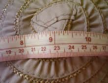 a measuring tape is on top of a dress