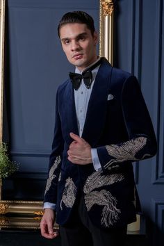 Blue tuxedo featuring bead, zari, cutpipe detailing in unicorn pattern on the sleeves and front. Paired with a pintuck detailed front shirt, a solid black trouser, a pocket square, a bow tie and a waist band. - Aza Fashions Luxury Blue Suits For Festive Occasions, Luxury Blue Suits For Festive Season, Formal Embroidered Blue Suits, Formal Blue Embroidered Suits, Blue Tuxedo, Majestic Unicorn, Blue Tuxedos, Tuxedo Pants, Unicorn Pattern