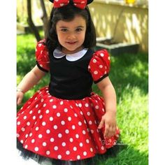 This red Minnie Mouse inspired costume is specially designed for toddlers. It is perfect for many special occasions like birthdays, family photo shooting, pageants, school parties, Christmas, Halloween and holidays, as well as Minnie Mouse themed parties. This Minnie Mouse dress for toddlers and little girls is our own design and make. It is made of white polka dotted top quality red satin with black crystal tulle for a fluffy skirt and black matt satin bodice. It is decorated with a bow on the Minnie Mouse Birthday Dress, Baby First Birthday Dress, Elsa Halloween Costume, Halloween Costume Design, Minnie Mouse Birthday Outfit, White Polka Dot Top, Mouse Dress, First Birthday Dresses, Minnie Mouse Dress