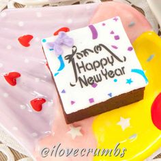 a happy new year cake on a plate