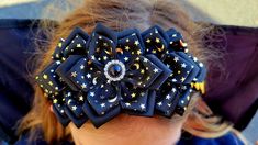 This adorable Black and Gold Galaxy Headband is handmade in the Nicola Valley, British Columbia, Canada.  Colors are black and gold.  Colors may vary slightly depending on current stock.  Headband is metal underneath so it is more durable and high quality.  Fits size child 3 years and up to adult. Small parts, Not recommended for children under 3. Galaxy Headband, Gold Galaxy, Space Theme Party, Halloween Hair, Gold Colors, Party Halloween, Turban Headbands, Space Theme, Hair Accessories Headbands