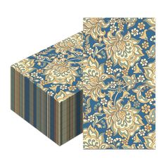 an image of a blue and yellow paper with floral designs on the front, in two different colors