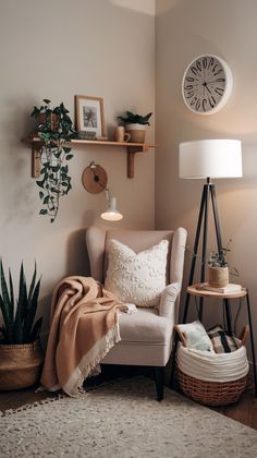 a living room with a chair, lamp and potted plants on the wall next to it