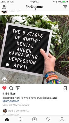 someone holding up a sign that says the 5 stages of winter