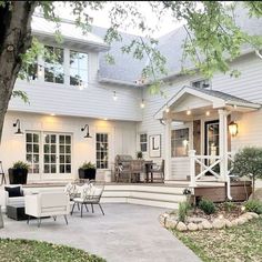 a screen shot of a house that has been built on the front porch with steps leading up to it