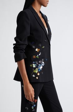 This tailored one-button blazer is elevated with lustrous sequined blooms and scrunched sleeves. 23 1/2" length (size 8) One-button closure Peaked lapels Three-quarter sleeves with five-button cuffs Front flap pockets 68% triacetate, 31% polyester Dry clean Imported Flower Blazer, Bride Pantsuit, Crisp White Blouse, Sequin Flower, Sequin Blazer, Modest Bridesmaid Dresses, Blazer Set, Blazer Designs, Custom Jacket