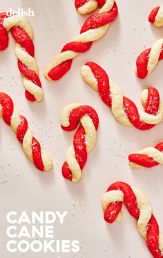 red and white candy cane cookies are on a plate