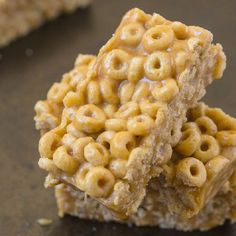 two pieces of cereal krispy treats stacked on top of each other