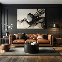 a living room with brown leather furniture and paintings on the wall above it, along with wooden flooring