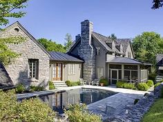 a house with a pool in the front yard