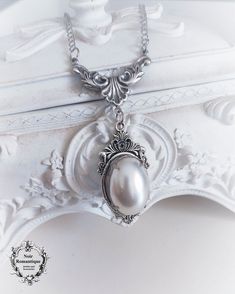 ♥♥Noir Romantique♥♥ Welcome to my store! This amazing victorian inspired necklace is made of silver  finding beautifully combined with pearl oval gem 18x25mm ♥♥ Nickel and lead free ♥♥It will be sent to you carefully gift wrapped through registered mail(this means that tracking number will be provided to you as soon as I send your order). Victorian Gothic Jewelry, Almond Eyes, Winter Color Palette, Soft Winter, Silver Pearl Necklace, Diamond Face, Inspired Necklace, Winter Color, Victorian Gothic