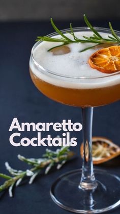 an orange cocktail garnished with rosemary